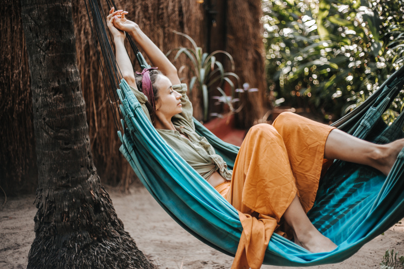 A Woman Lying on a Hammock and Resting